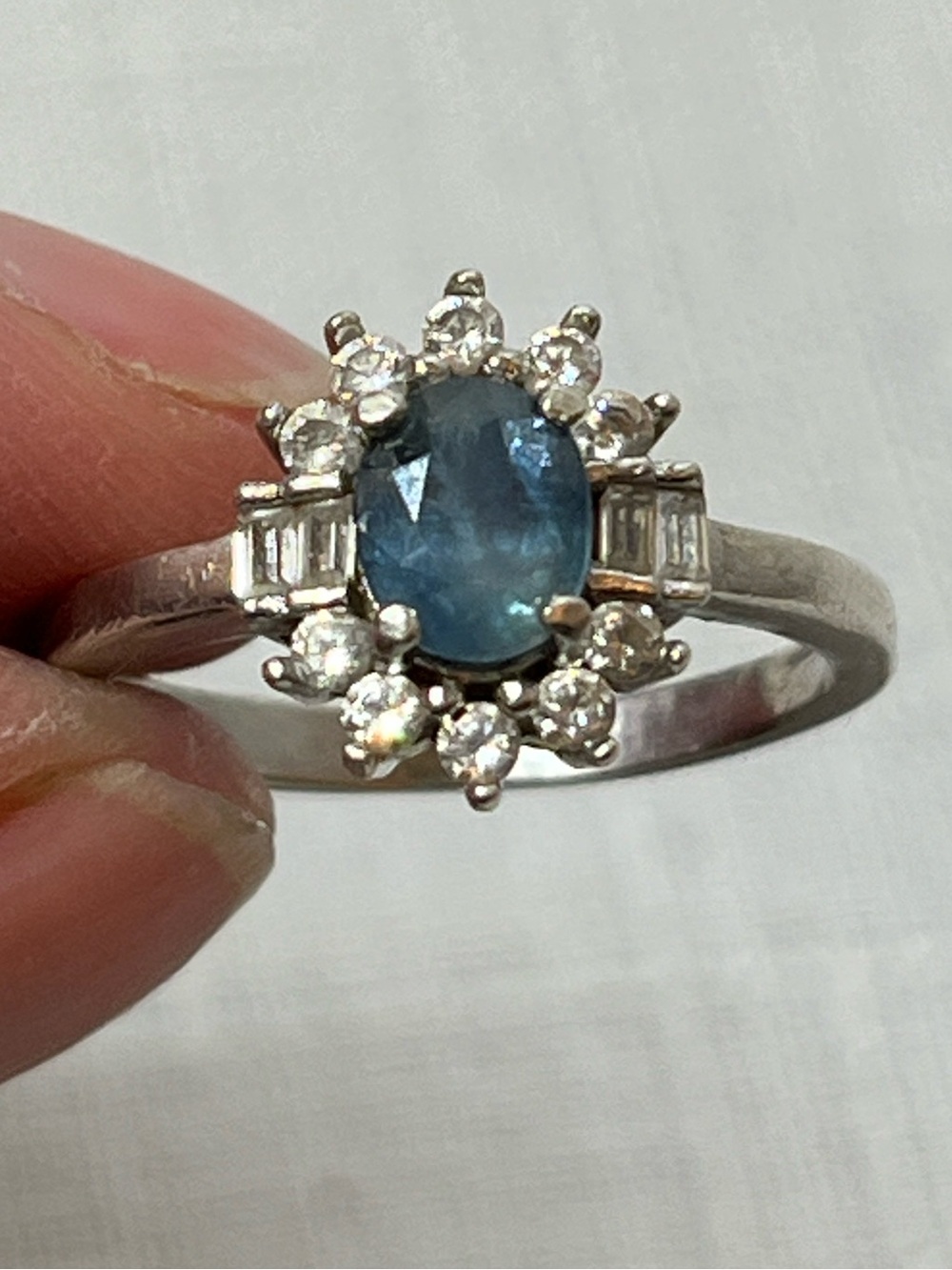 Sterling Silver Blue Sapphire Halo Ring
Size 6
Stamped